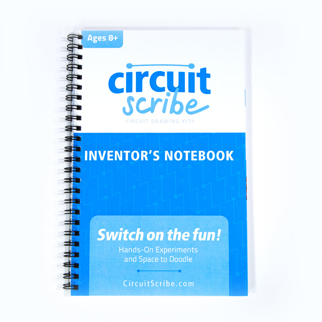 The Circuit Scribe Inventors Notebook with circuit projects on a white background. Rectangular notebook with blue and white writing. This notebook covers many concepts of electronics. 